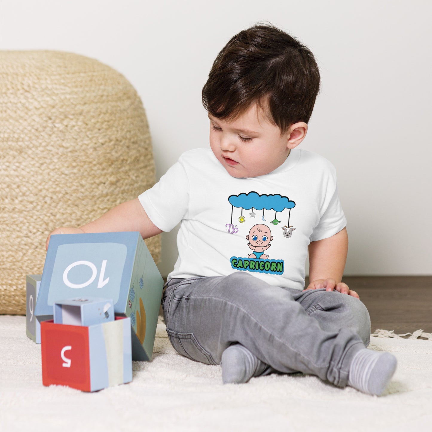 white Baby T-shirt with Capricorn symbol and celestial design
