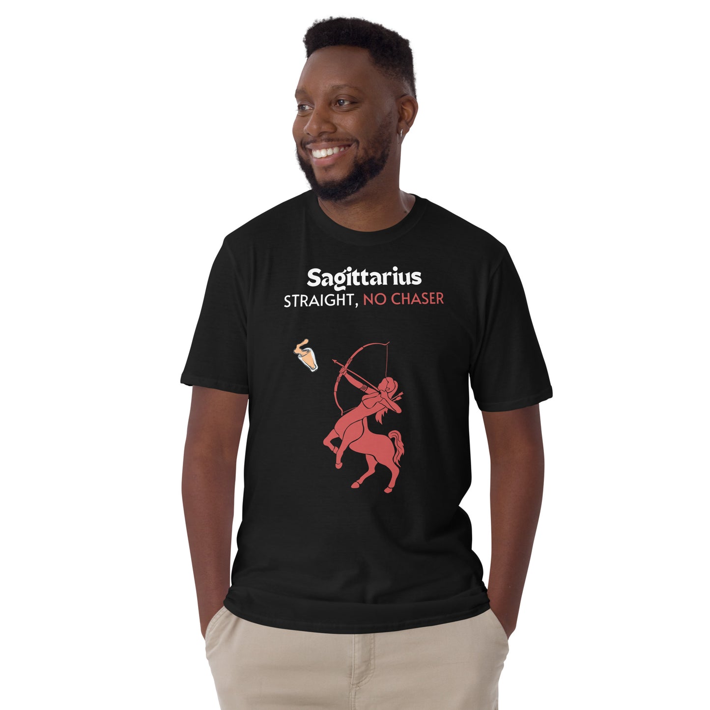 model wearing black t-shirt lying flat on a light background, featuring a bold "Sagittarius - Straight, No Chaser" design. The graphic showcases a red centaur archer aiming at a drink, embodying the fearless and straightforward nature of Sagittarius.