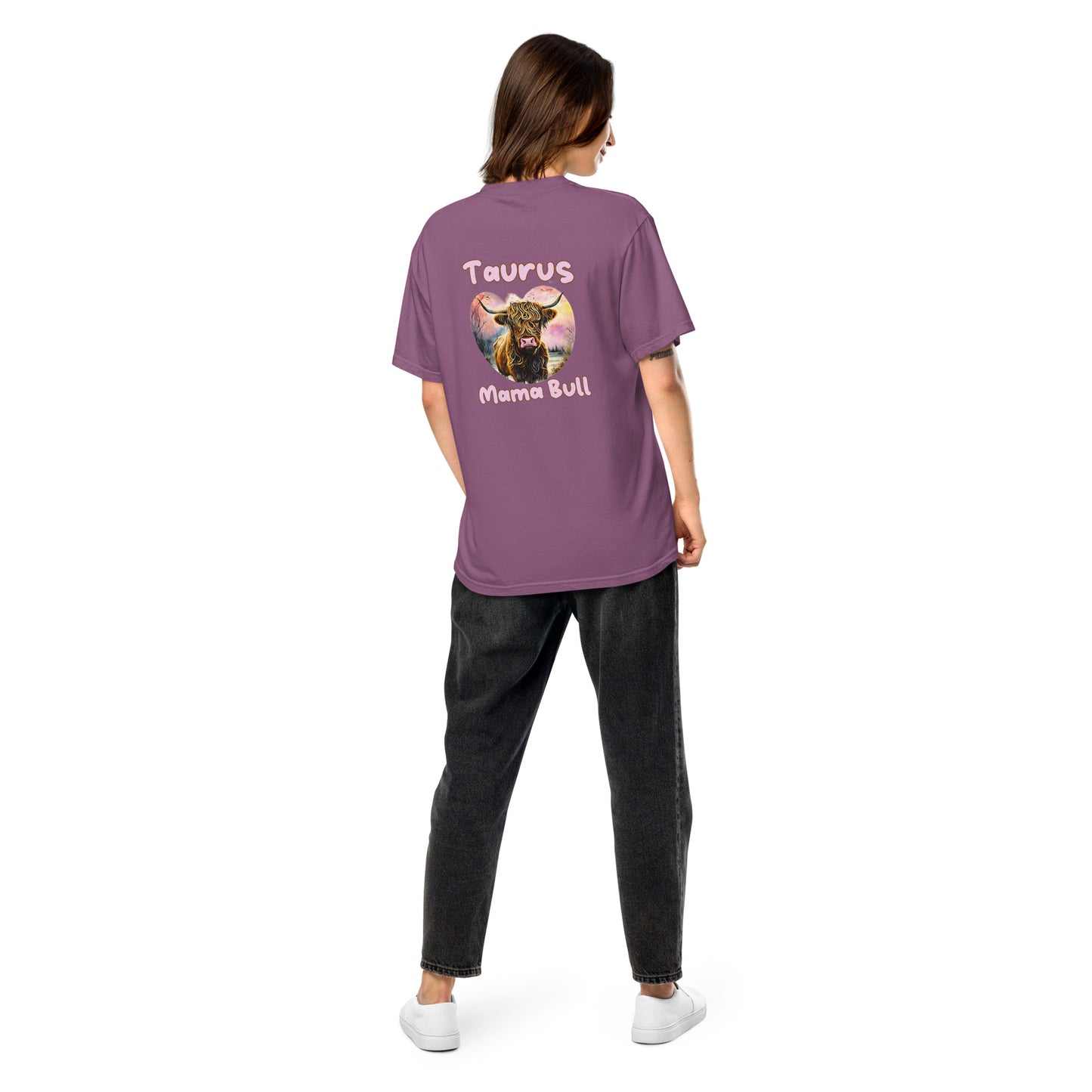 woman wearing a berry-colored comfort colors t-shirt that says Taurus Mama Bull with a heart-shaped nature scene graphic of a realistic cartoon bull