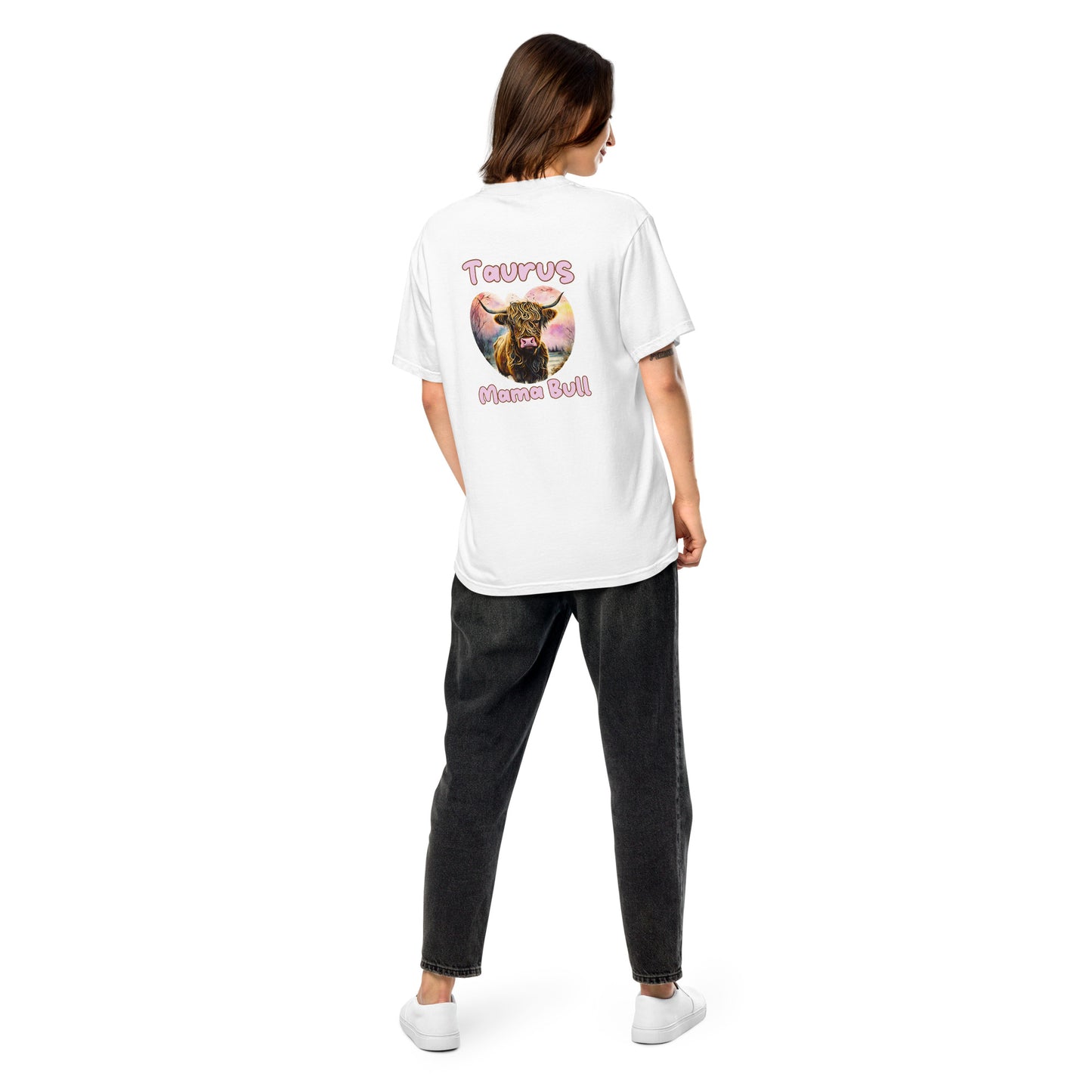 woman wearing a white colored comfort colors t-shirt that says Taurus Mama Bull with a heart-shaped nature scene graphic of a realistic cartoon bull