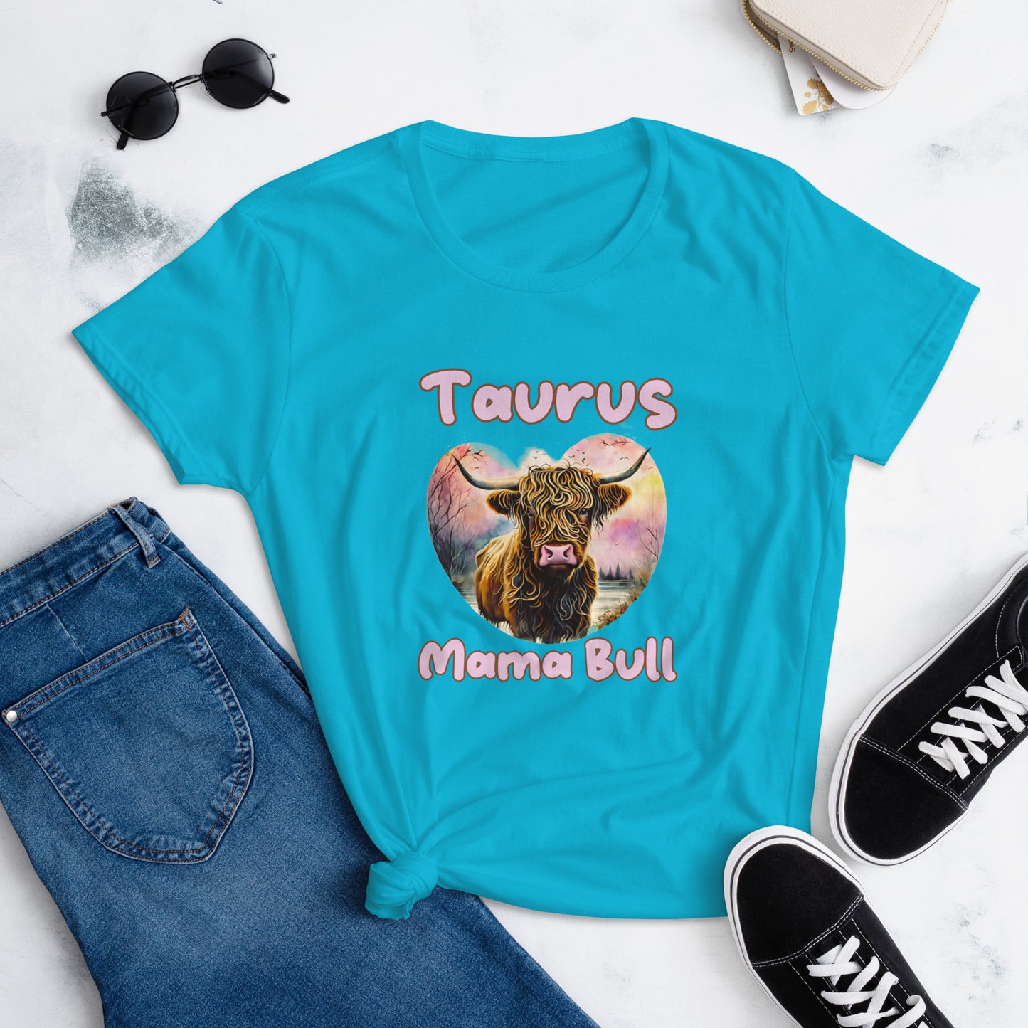 caribbean blue t-shirt with a colorful illustration of a bull, captioned "Taurus Mama Bull" in playful text.