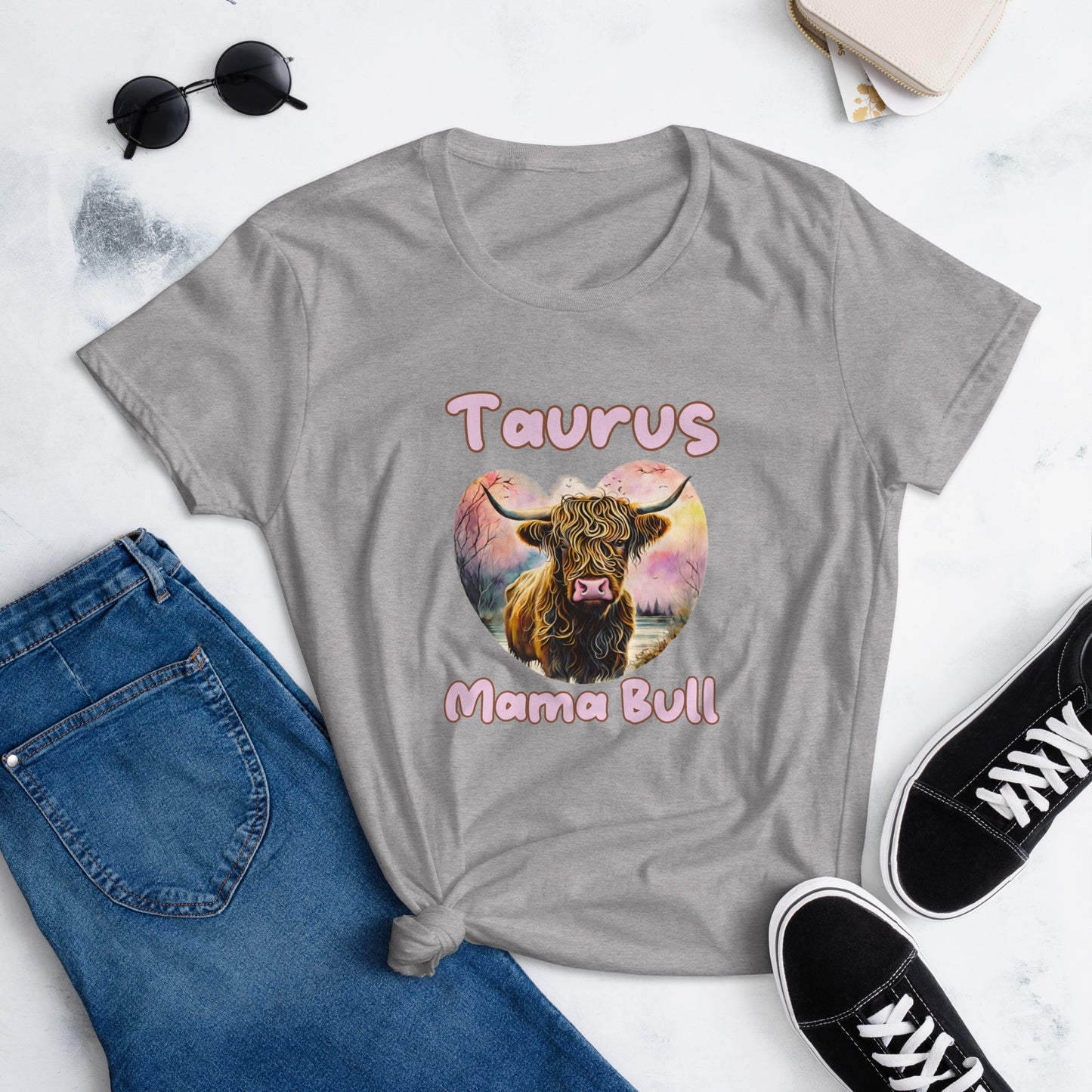 heather grey t-shirt with a colorful illustration of a bull, captioned "Taurus Mama Bull" in playful text.