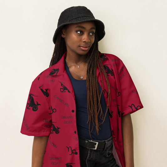 unisex astrology  "Grumpy Goat" all-over print button-up shirt in red, featuring playful Capricorn graphics and a cheeky slogan, perfect for showcasing your Capricorn pride.