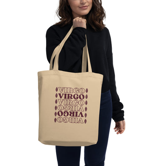 beige-colored Eco Tote Bag that says Virgo six times in alternating outlined brown and completely brown text with cute leaf design down the sides.