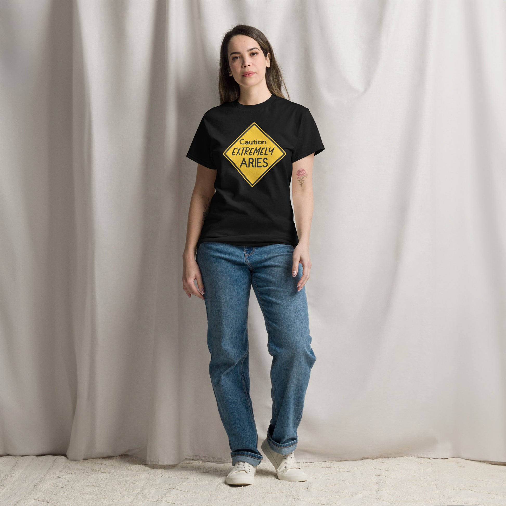 Black t-shirt with yellow caution symbol with "Caution Extremely Aries" in the center