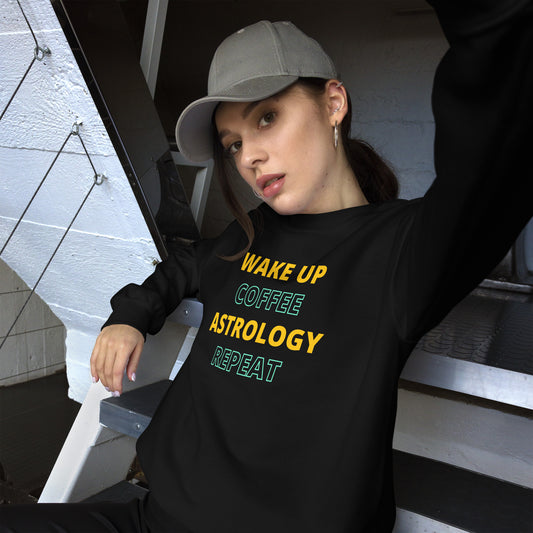 black gildan crewneck that says Wake Up, Coffee, Astrology, Repeat in bright yellow and teal text